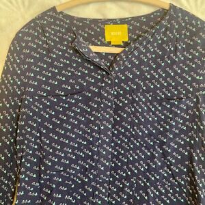 MAUVE (Anthropologie) navy button up blouse with small bird design